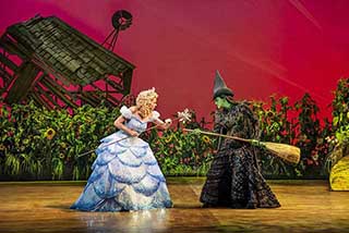 Sophie Evans as Glinda and Alice Fearn as Elphaba. Photo by Matt Crockett